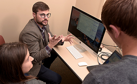 photo of Dr. Patrick Ledwidge with students